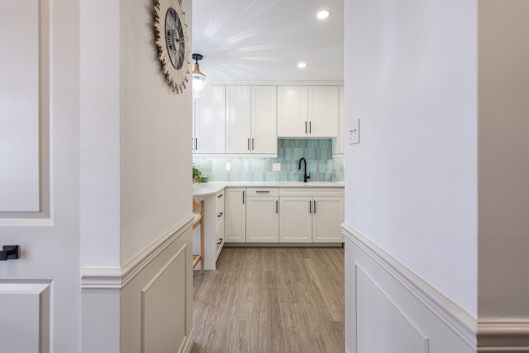 Redhaven kitchen detail with crafted cabinetry and stone counters